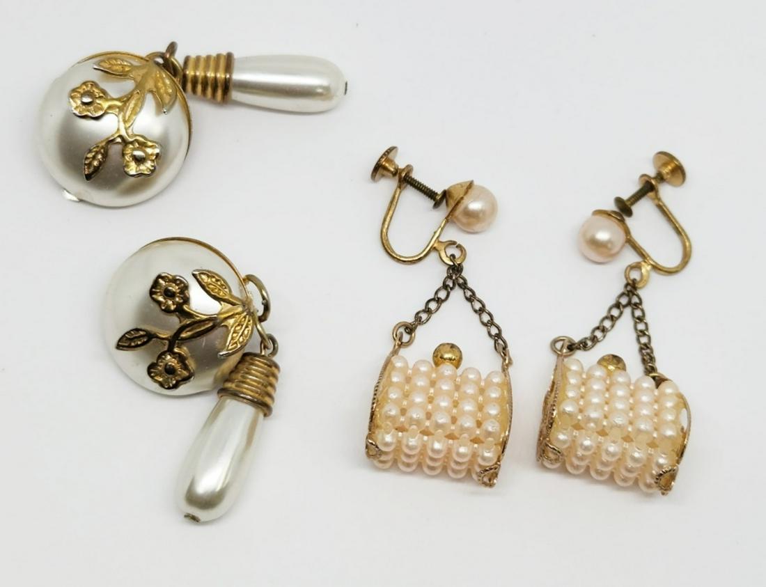 2-PAIRS OF VTG GOLD TONED TWIST BACK/CLIP ON: DANGLY EARRINGS (1)FLOWER DESIGN WITH CRÈME LUCITE & (1)PINK FAUX PEARL DANGLY PURSE DESIGN