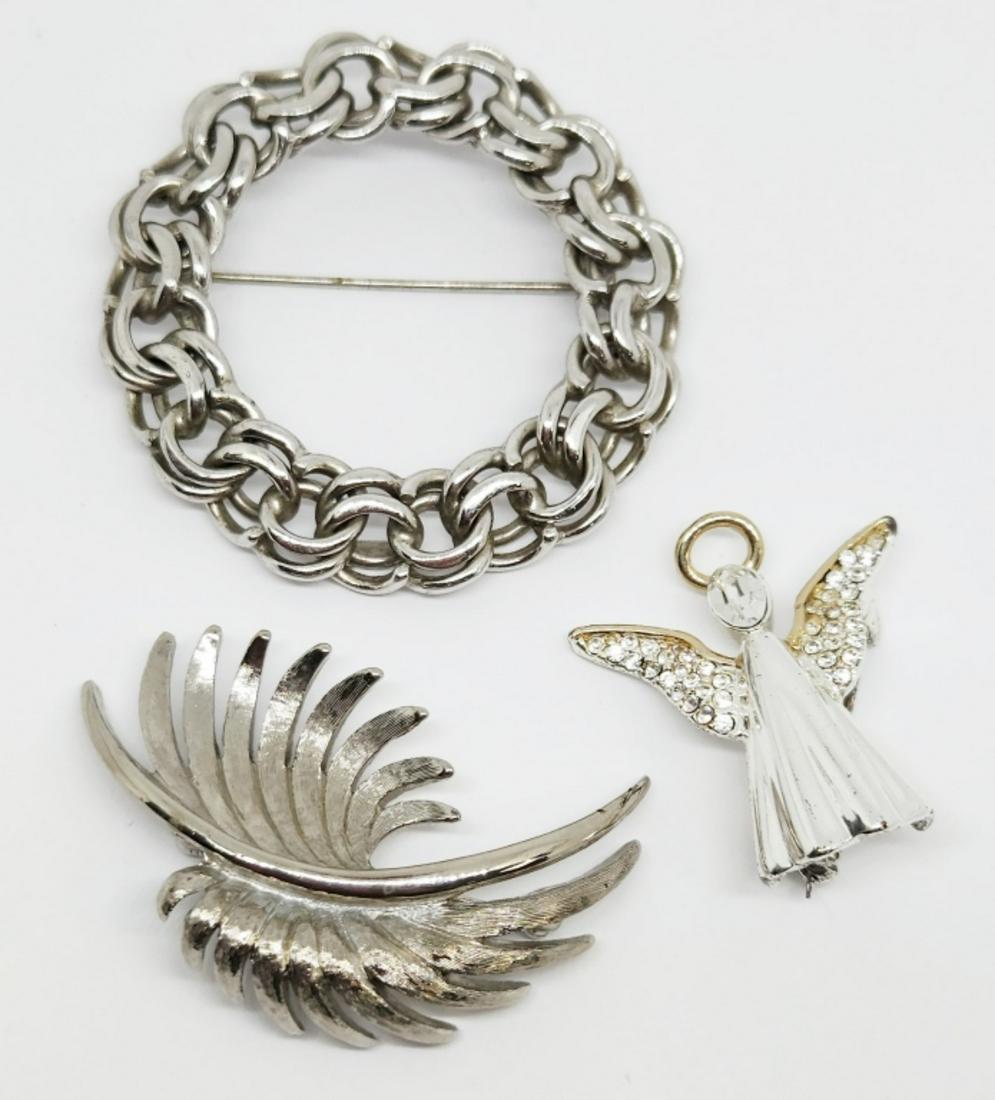 3-VINTAGE SILVER TONED BROOCHES: (1)AVON ANGEL WITH RHINESTONES & (2)MONET