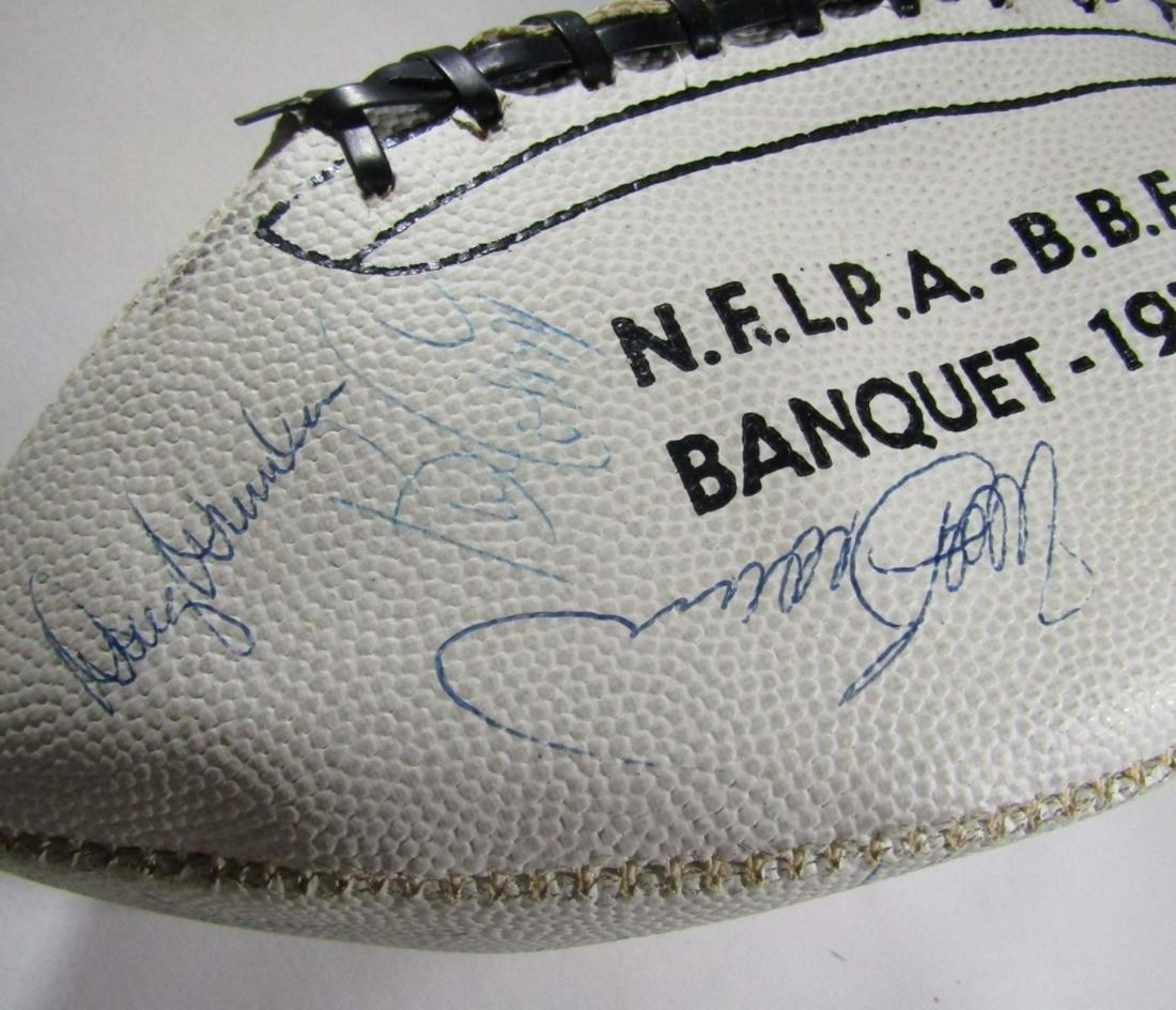 1978 NFLPA MULTI-SIGNED FOOTBALL -PAYTON: (31) SIGNATURES - BECKETT AUTHENTICITY - Signatures include WALTER PAYTON, WILLIE BROWN, ELVIN BEATHEA, GENE UPSHAW, BILL COSBY, MIKE PYLE, JOE WASHINGTON, ROGER STAUBACH, LARRY LITTLE, ROCKY BLEIER,
