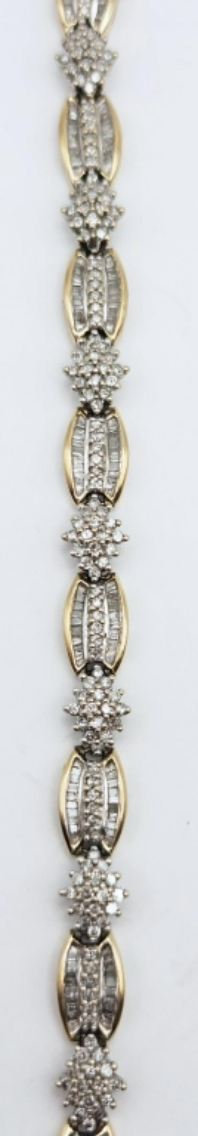 GORGEOUS STERLING GOLD TONED TENNIS BRACELET: WITH CZ! MEASURES 7.5 INCHES-TOTAL 14 DWT