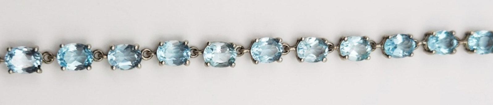 C.I.D STERLING TOPAZ FASHION BRACELET: MEASURES 7.5 INCHES-TOTAL 11 DWT