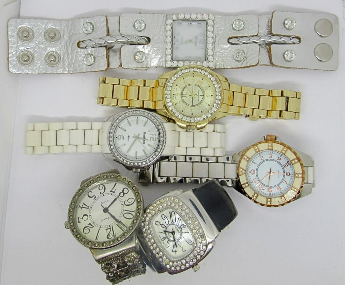 (6) Large Fashion Watch Lot: Assorted types of watches, including leather bands, cuff bracelets, and others. Brands like Geneva, Jessica Carlyle, Armitron, and more! All untested, can be used for parts and repair.
