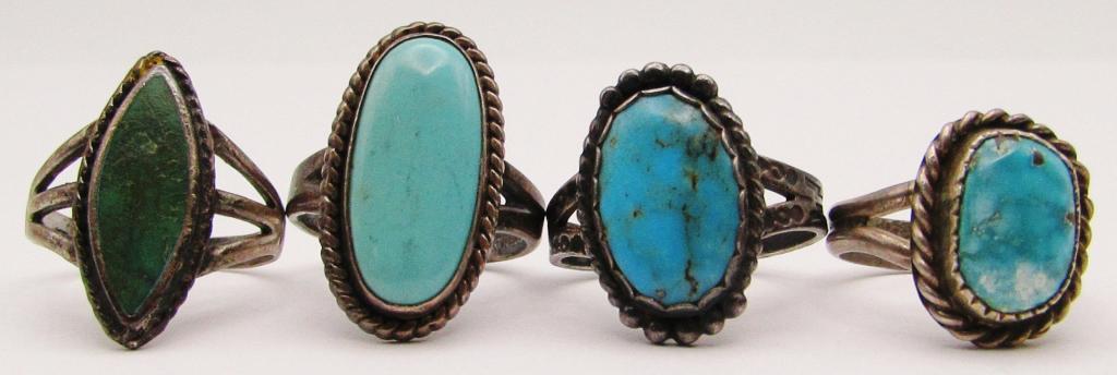 4 STERLING RINGS. TURQUOISE AND MALACHITE STONES: SIZE 5. 12 DWT TOTAL