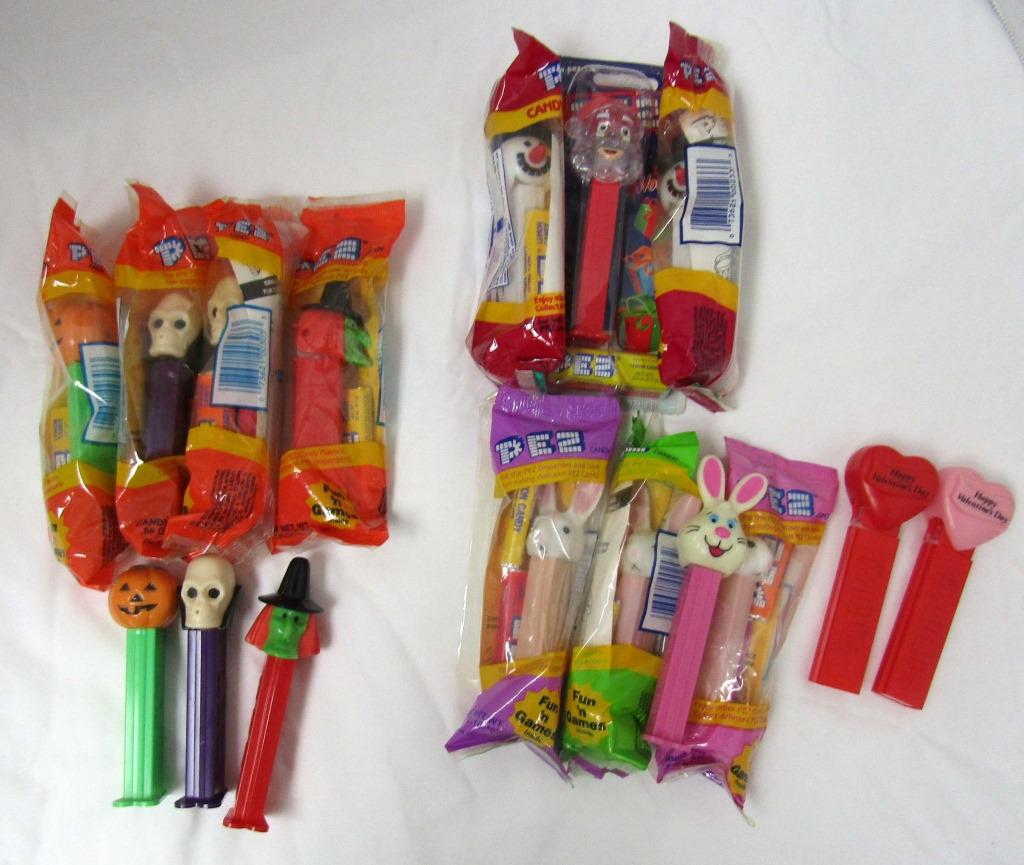 16 HOLIDAY PEZ FROM THE 1990'S: ONE IS MORE CURRENT; SOME UNOPENED