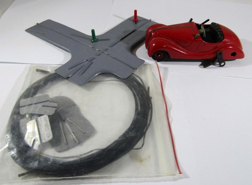 SCHUCO No 2002 AKUSTICO WIND UP CAR: WITH KEY / WIRES / PLACITC ROAD looks to be repaired / UNTESTED TO WORKING CONDITION