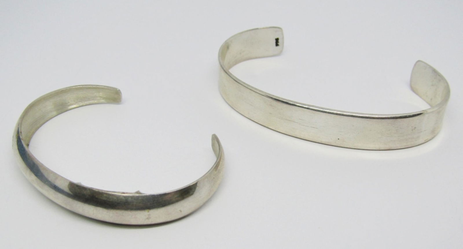 Sterling Cuff Bracelets Child and Adult: both marked with 925