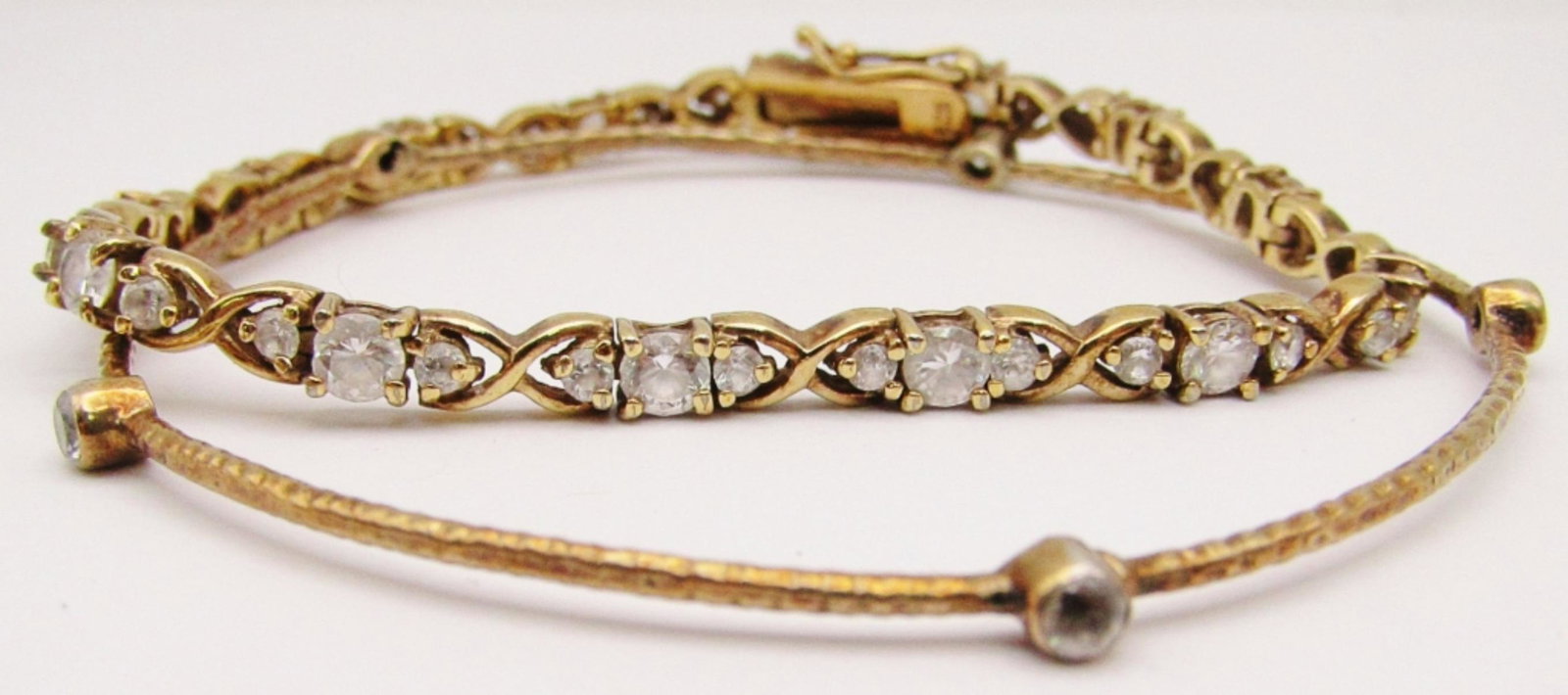 (2) VINTAGE STERLING BRACELETS (1) TENNIS: (1) BANGLE (11 DWT)