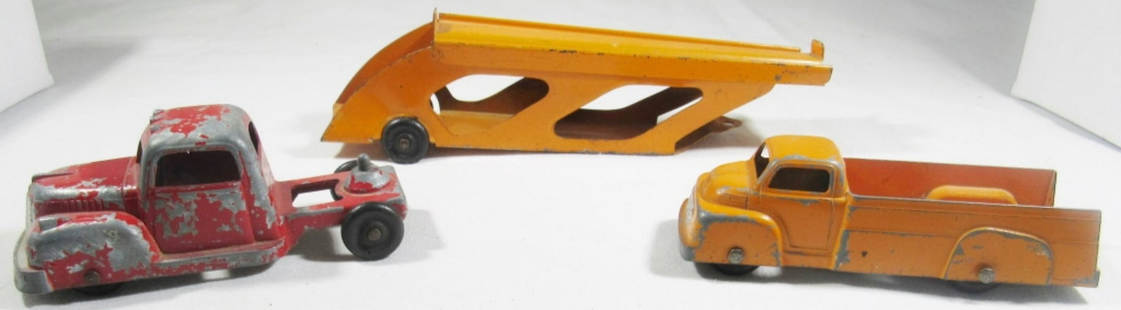 (2) VINTAGE TOOTSIETOY TRUCKS: (1) WITH CAR TRAILER
