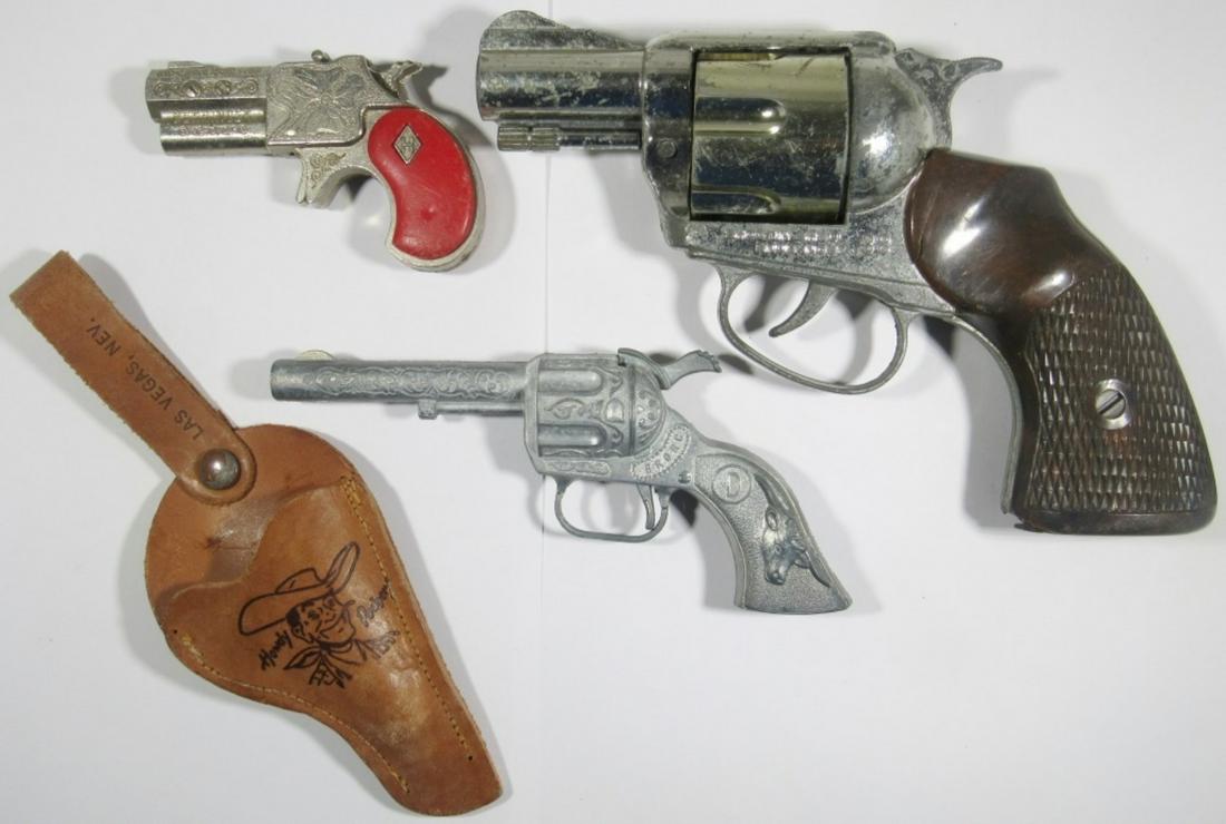 (3) TOY GUNS - SNUB-NOSE .38, DERRINGER, BRONCO: with HOLSTER - ALL NEED LIGHT REPAIR