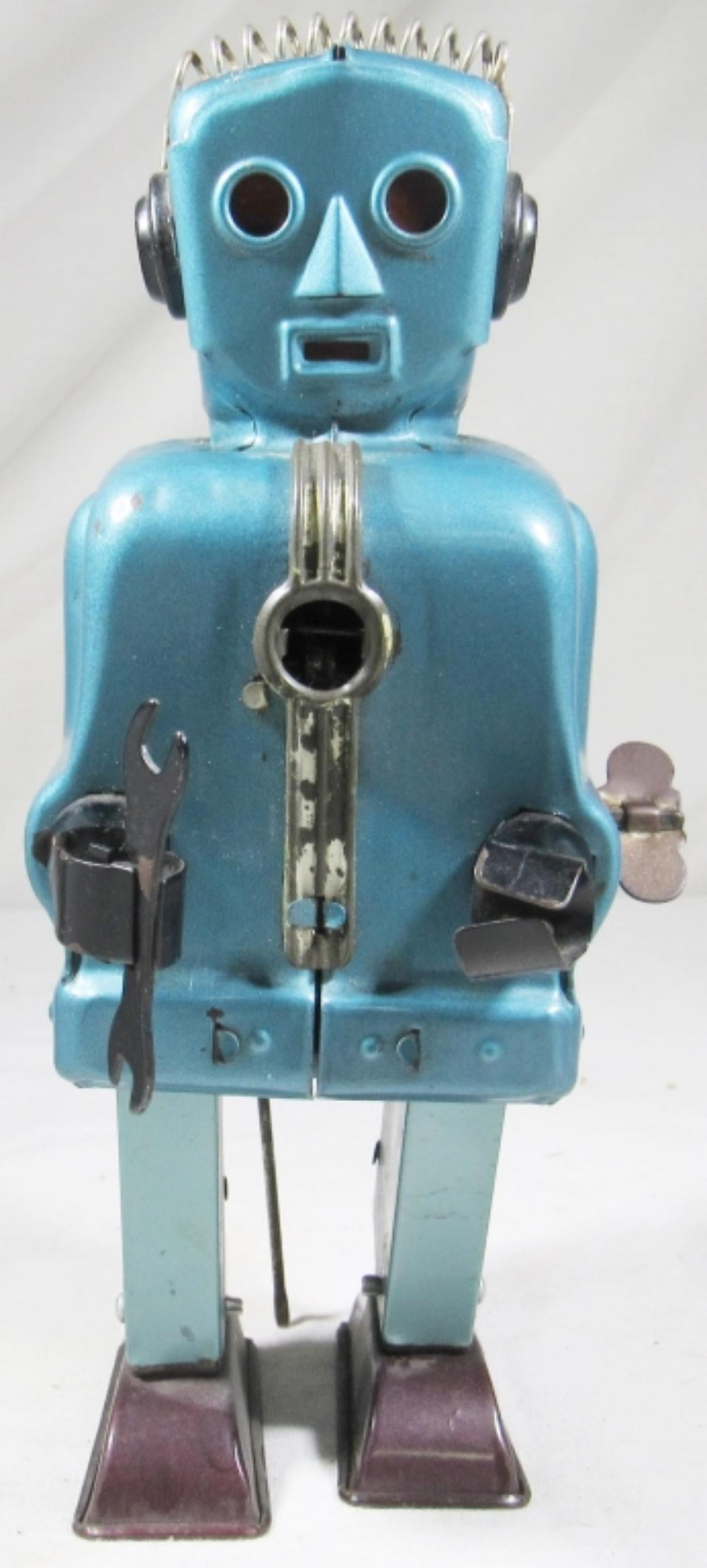 T.N. NOMURA TIN WIND UP: RATCHET ROBOT BY GEORGE WAGNER - WINDS UP AND WALKS - SLOW WORKING