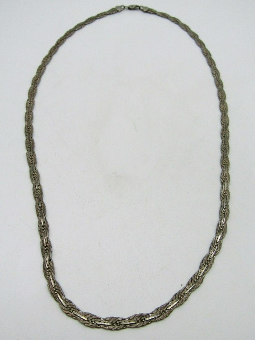 Sterling Snake Necklace: 24in in length marked with a 925, 15 dwt