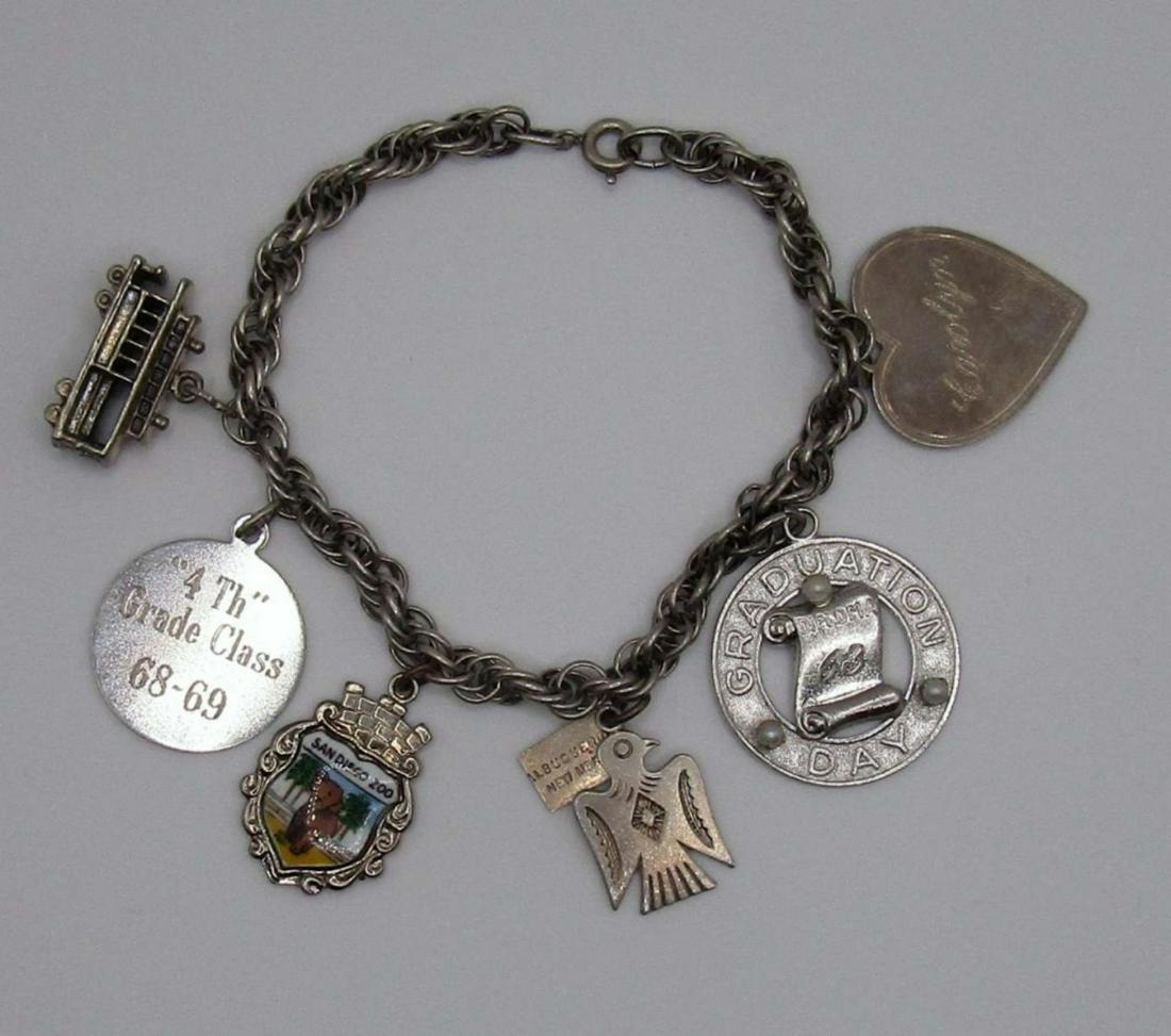 Sterling Charm Bracelet: 7 in bracelet with 6 charms,17DWT