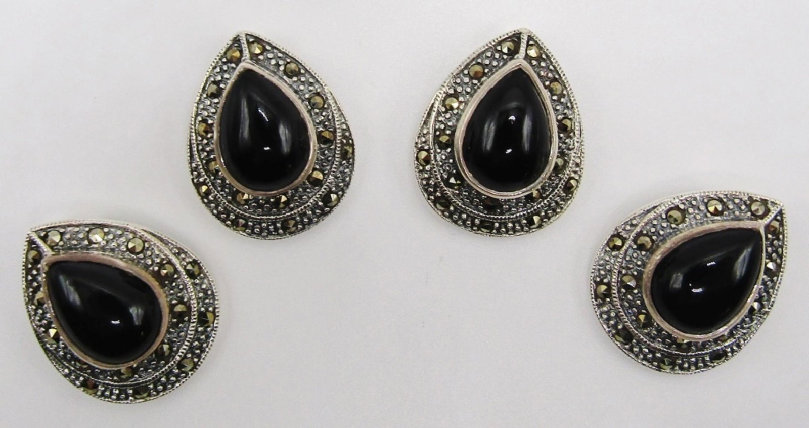 (4) Sterling Black Onyx Pendents: Black onyx with marcasite stones around it