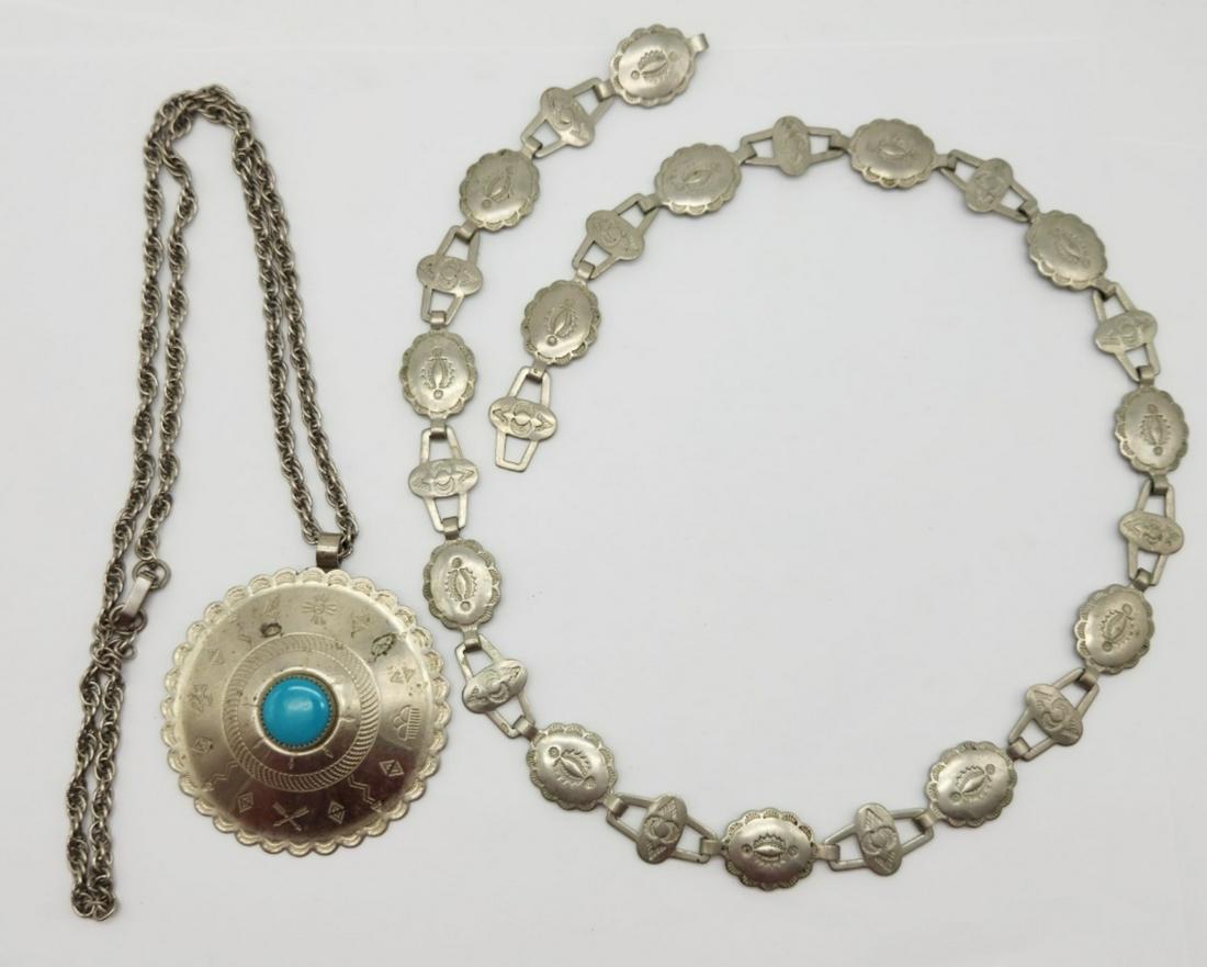 SOUTHWESTERN JEWELRY LOT: (1) CONCHO BELT: & (1) CIRCULAR PENDANT WITH TURQUOISE LUCITE CENTERWITH OPEN FLAP CLASP, 24IN IN LENGTH, BELT LENGTH IS 23IN IN LENGTH