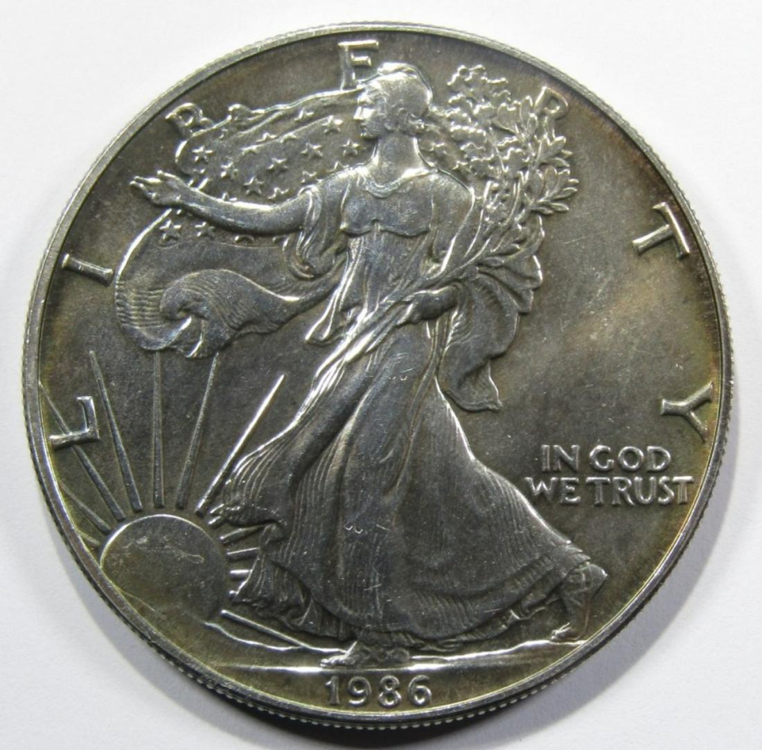 1986 AMERICAN SILVER EAGLE UNC (1 of 2)