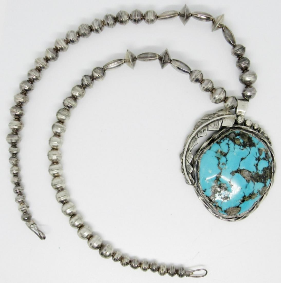 Navajo Sterling Turquoise Necklace: large pendant , stamped on the back, 20in length,57 dwt