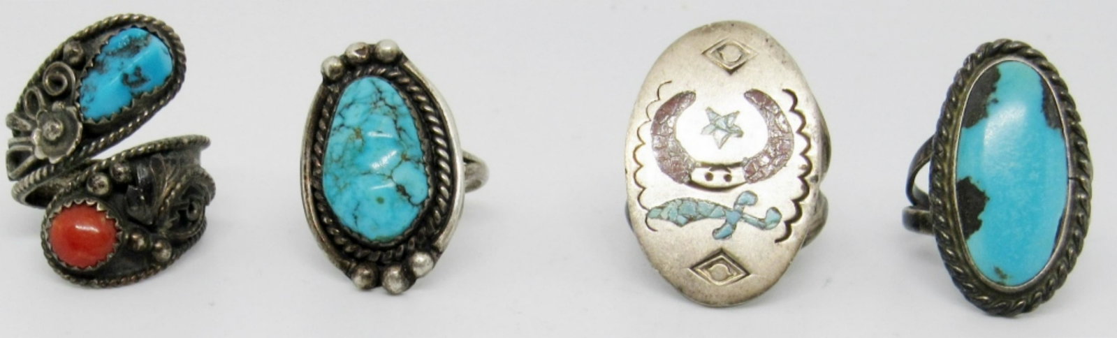 (4) Sterling Turquoise Rings: 20.3dwt, 1 twisted ring sz 7has turquoise and coarl stones, oval ring with crushed coral and turquoise stones in the middle, size 9 1/2 has a marking EGA, oval turquoise ring size 8,Turquoise ring siz
