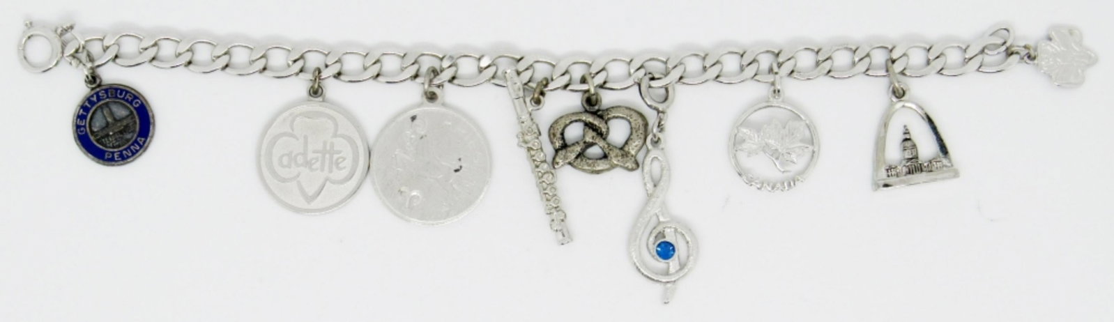 Sterling Charm Bracelet: 19dwt, 7in length, has 9 charms all marked with sterling or 925 on charms, marked sterling on clasp