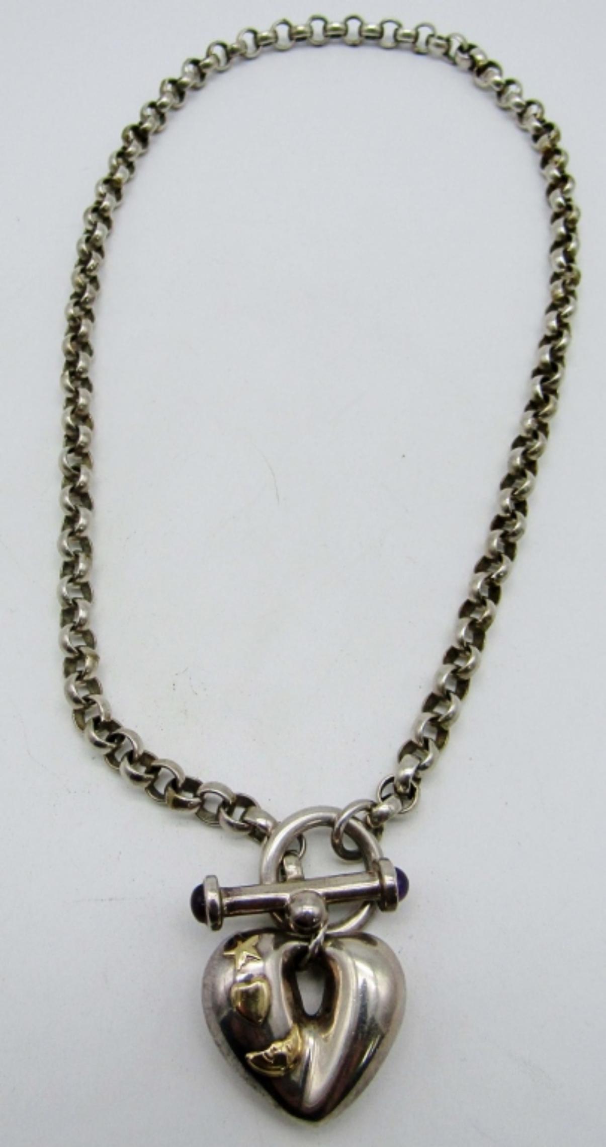 Sterling/18k Rolo Chain with Heart Pendant: 30dwt, 20in, toggle clasp, Heart pendant at 18k fill of a heart,moon, and star, stamped on back with 925 and 18k
