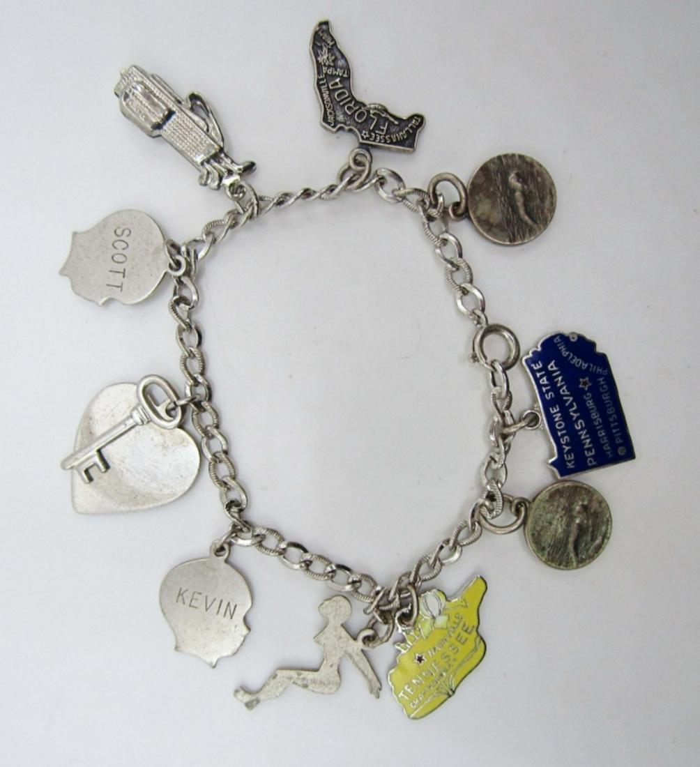 Sterling Charm Bracelet: 12dwt,10 charms, stamped sterling