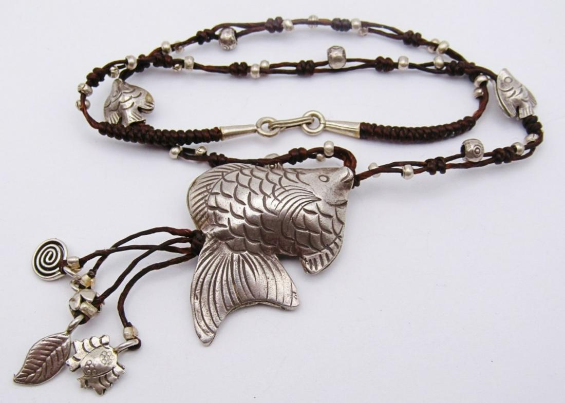 COOL STERLING FISH NECKLACE on CORDED LEATHER: 16" LONG (14 DWT)