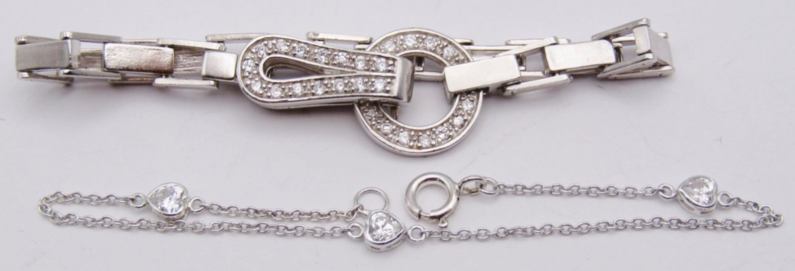 (2) 7" STERLING BRACELETS w/CLEAR GEMS: (1) UNIQUE LATCH (1) HEART GEMS