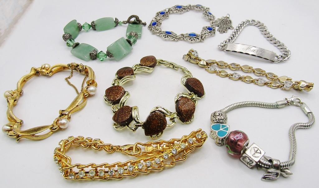 BRACELET LOT- MISC STYLES: SEE PICTURES- GOLD TONED, SILVER, CHARM, BEADED AND MORE