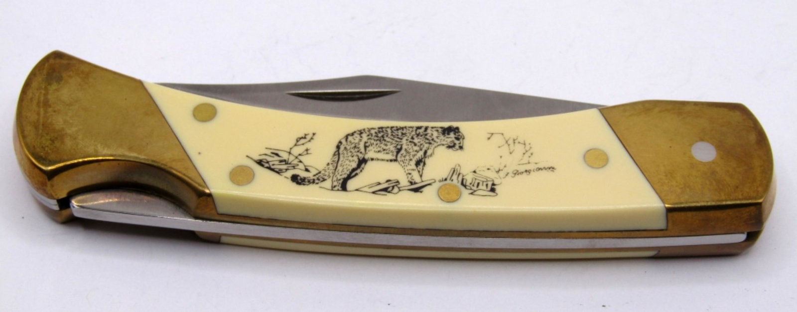 Schrade+ 507SC Scrimshaw Cheetah Lockback Knife: Single Blade Folding Lockback Knife; Giorgianni Signed Scrimshaw on Handle; Very Nic Condition!