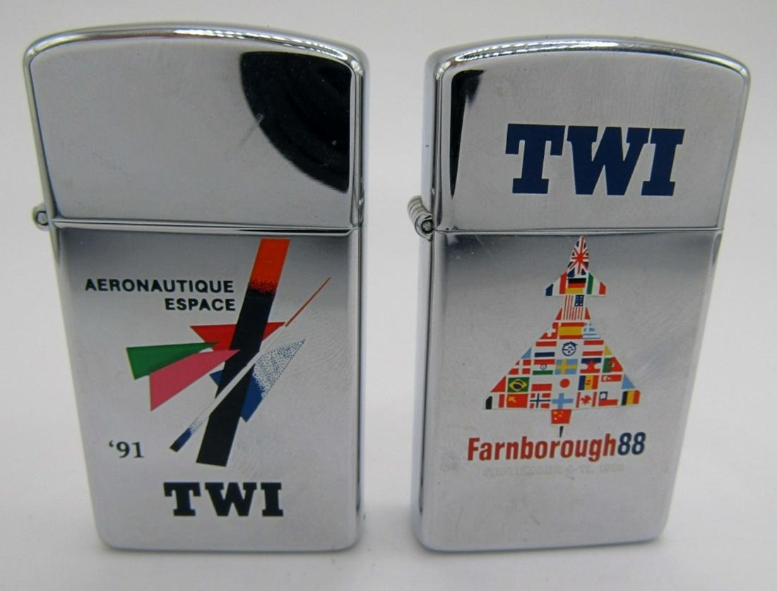 (2) TWI Slim Zippo Lighters 1988 & 1992 (Unfired): TWI Aeronautique Espace '91; TWI Farnborough 88 (Used Condition)