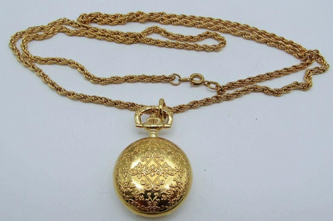 GOLD TONE WATCH LOCKET NECKLACE: 30IN LENGTH, RELIC WATCH ,NOT TESTED