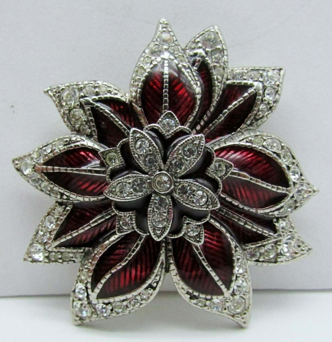 MONET CLEAR STONE WITH RED INLAY BROOCH: NEAR 3IN IN LENGTH,STAMPED MONET ON BACK