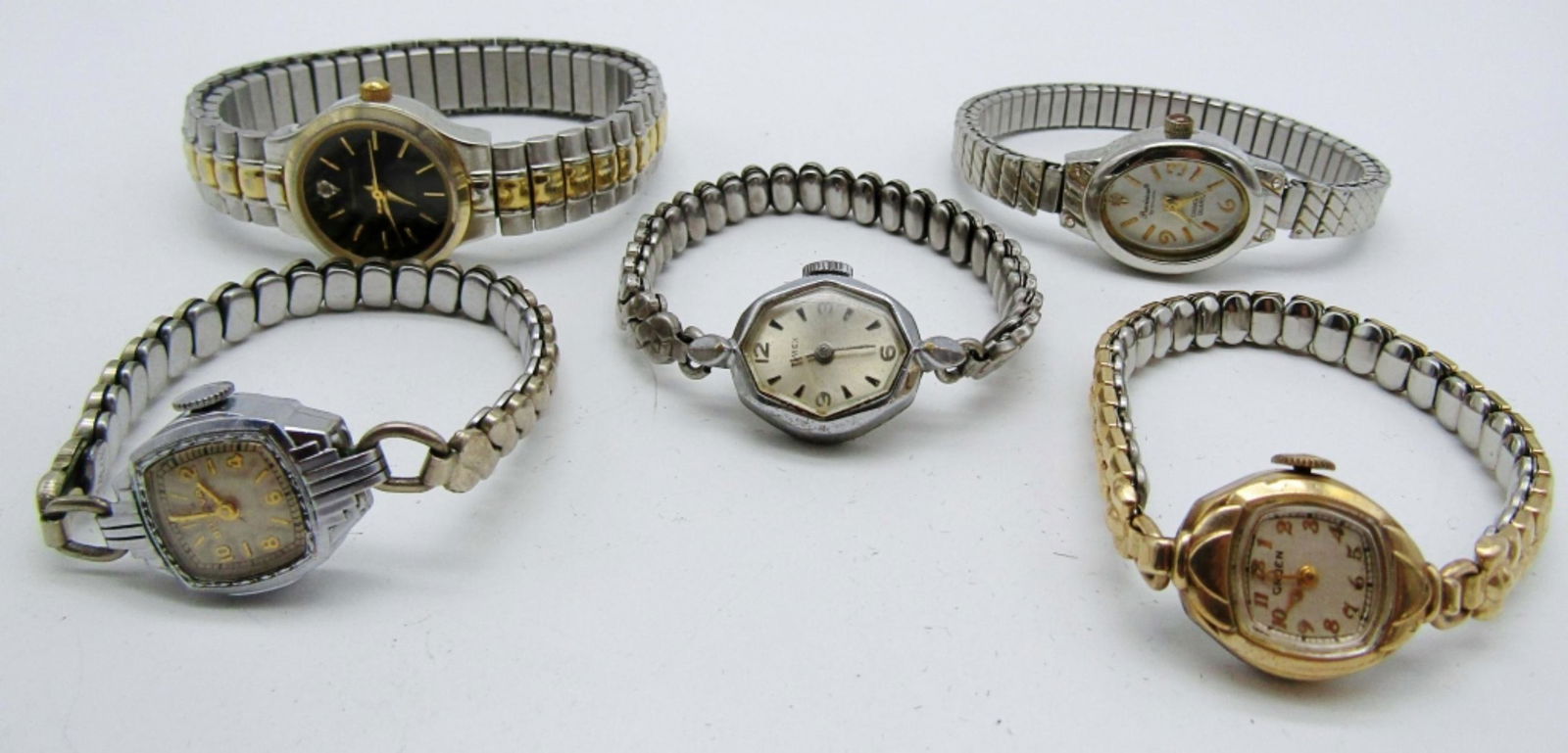 5 STRETCHED BAND WATCHES: NOT TESTED, BRANDS TIMEX, 2- GRUEN, BULOVA, SERGIO VALENTE