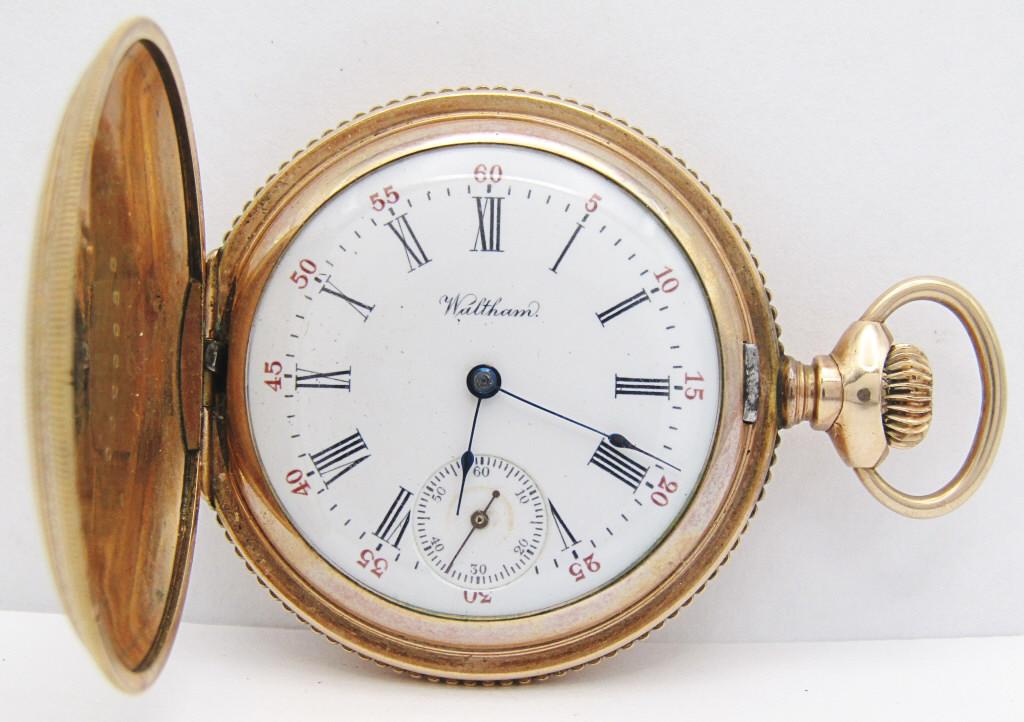 Waltham 15 Jewel Hunter, 0 Size: Roman Numeral Porcelain Dial; Fancy Hinged Yellow Gold Filled Case