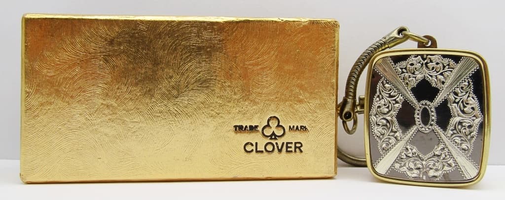Vintage Sankyo Clover Windup Keychain Musicbox: Plays Raindrops! Lightly Used Condition.