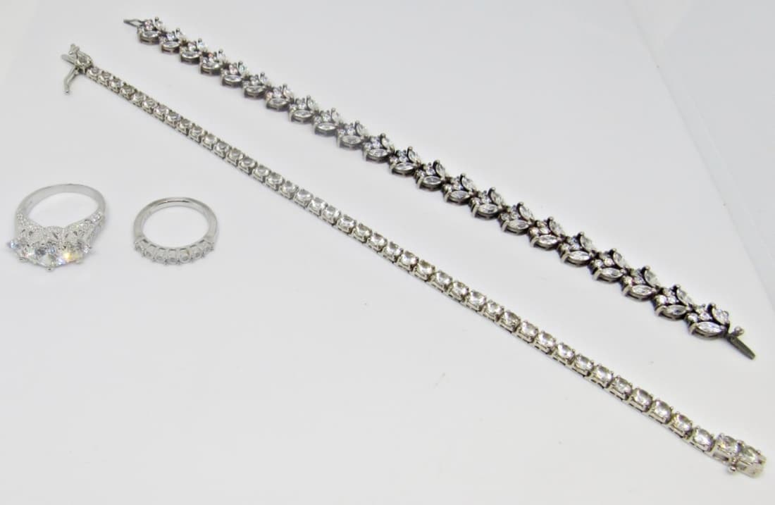 STERLING BLING JEWELRY LOT - (2) RINGS: (2) BRACELETS - RINGS SIZE 7 & 9 , BRACELET 7" & 8 1/2" (31 DWT)