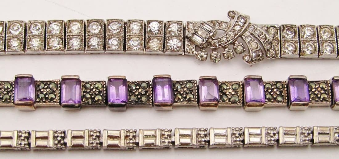 (3) STERLING FASHION BRACELETS: MARCASITE / PURPLE STONE 7"; VINTAGE CLEAR STONE 7"; SILVER 925 7 1/2" ( 35 DWT)