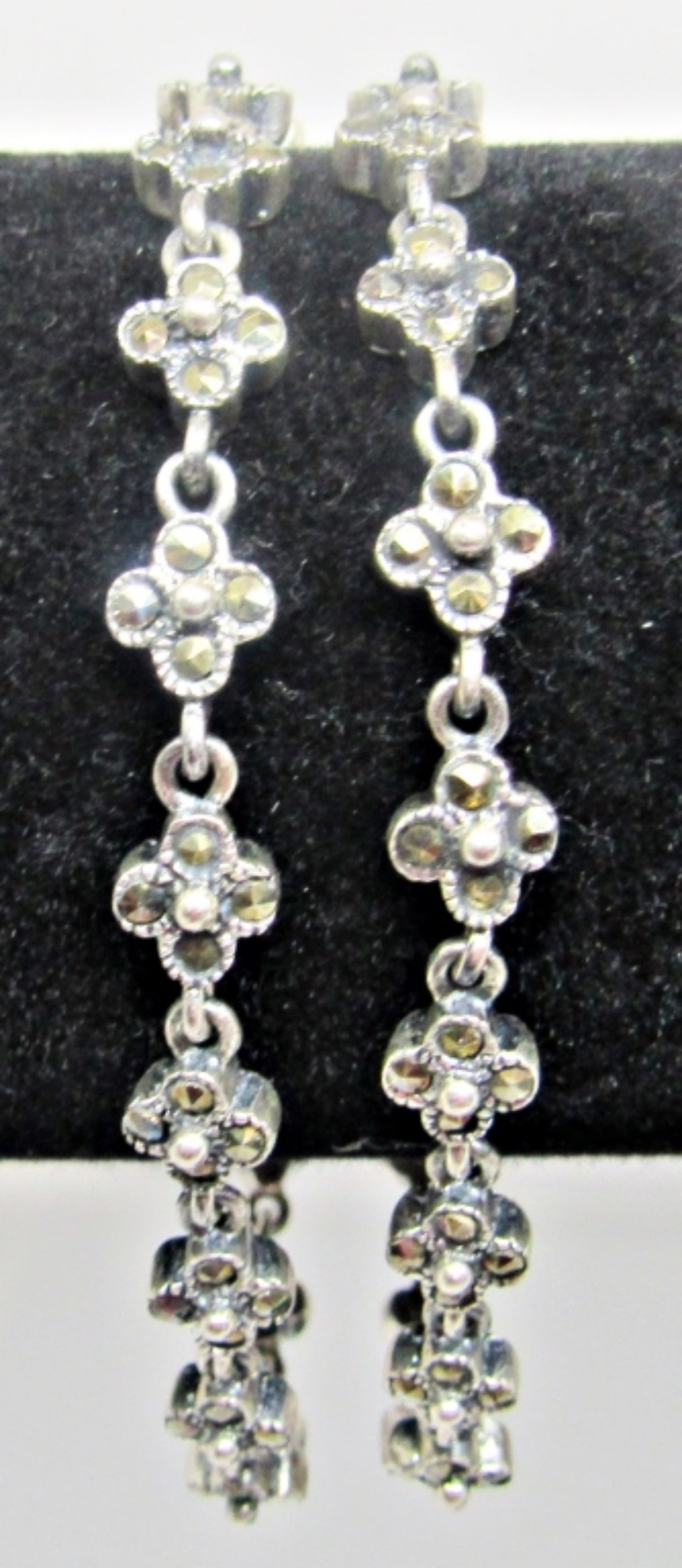 Double Layered Marcasite Sterling Bracelet: 20dwt,8in in length, flower design with marcasite stones, open box clasp with stamp 925 inside the clasp