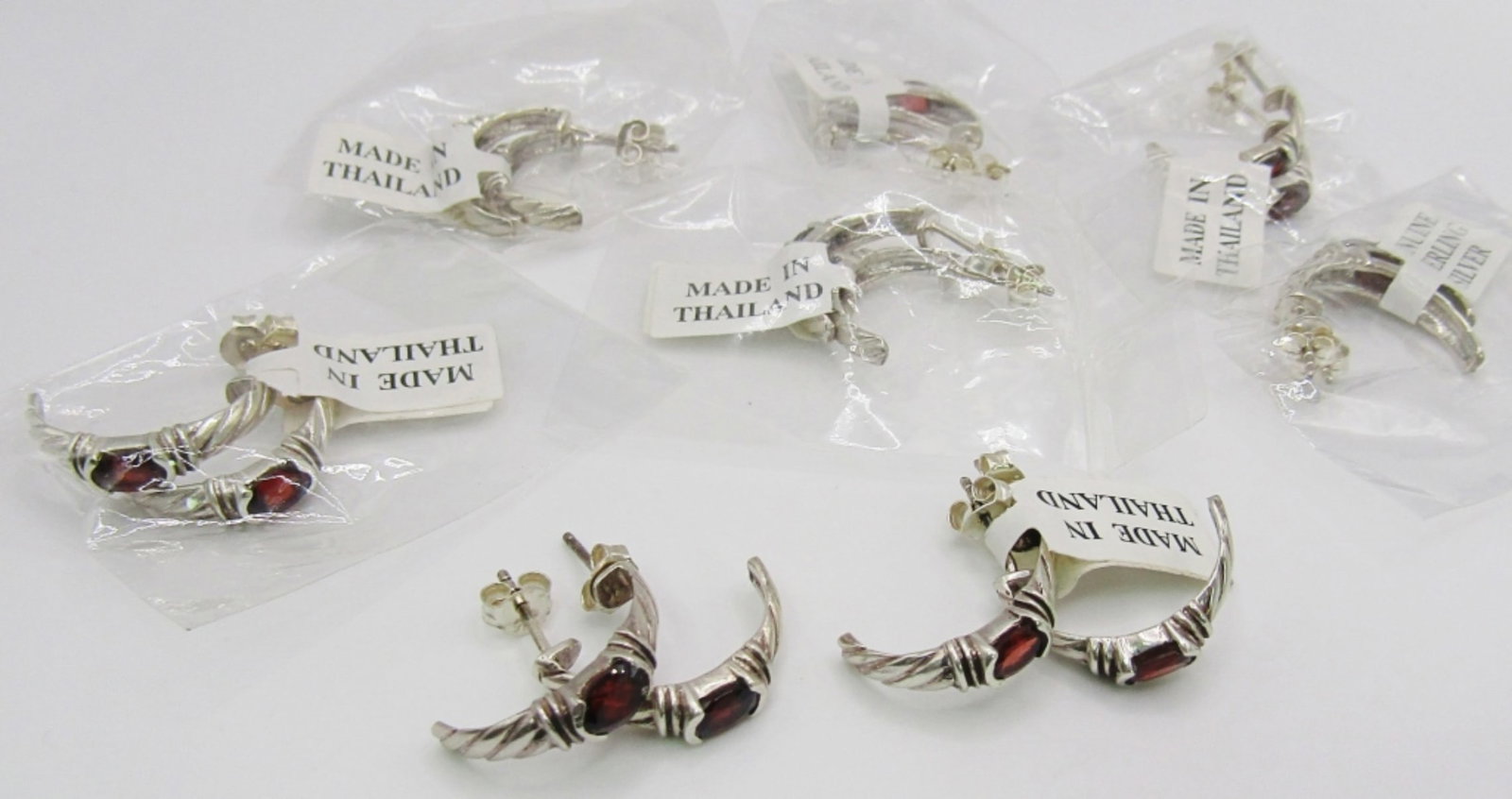 Jewelers Lot! (8) Pierced Half Hoops: sterling earrings with garnet stones, 15dwt