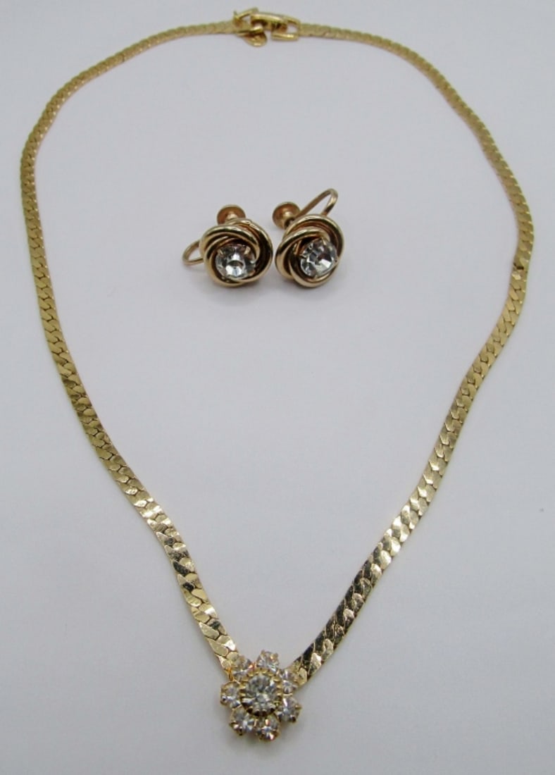 PARKLANE COLLAR NECKLACE & CORO CLIPONS: 16IN IN LENGTH, CLEAR STONES MAKE FLOWER IN MIDDLE, OPEN BOX CLASP, SCREWON CLIP ONS, BOTH STAMPED WITH BRANDS NAME