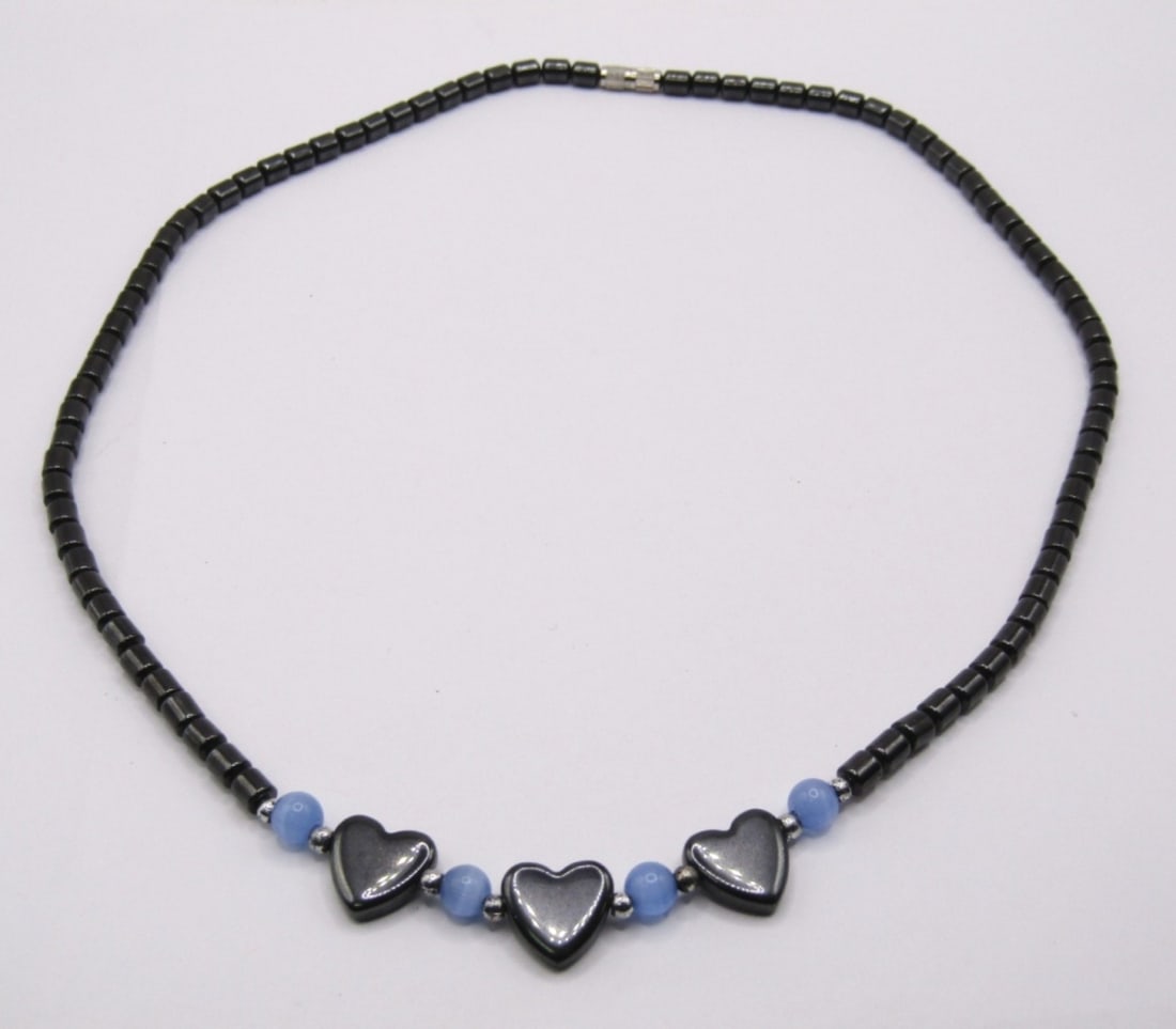 HEMATITE BEADED NECKLACE WITH HEARTS AND LIGHT BLU: HEMATITE BEADED NECKLACE WITH TRIPLE HEART DESIGN AND LIGHT BLUE ACCENT BEADS, TINY TWIST CLASP