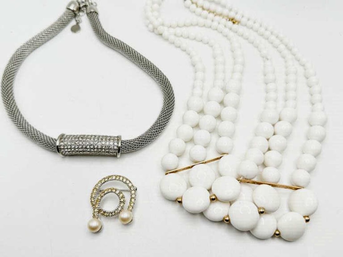 (2) NECKLACES & VINTAGE PIN ASSORTMENT: White beaded fashion necklace with gold tones, layered Second is a Charter Clue brand choker with clear stones around the pendant. adjustable sizing.