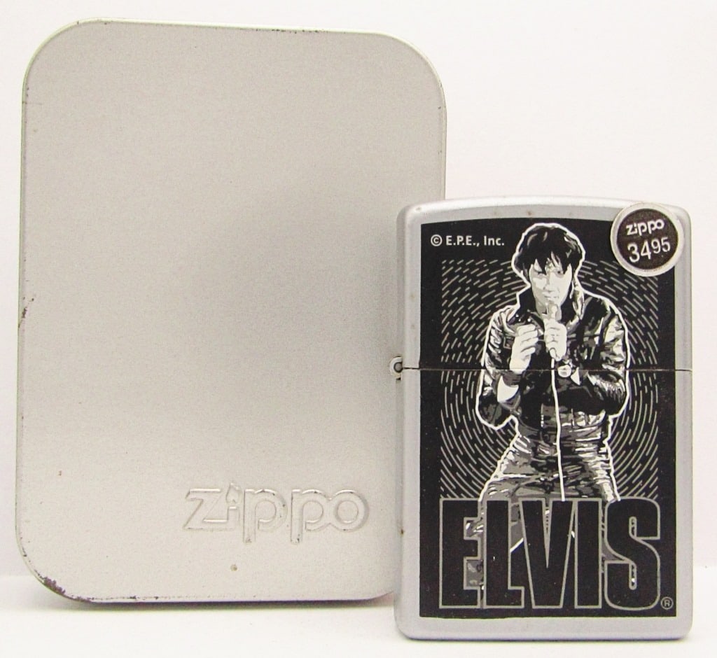 2002 NIB Elvis in Leather SEALED Zippo Lighter: New In Box.