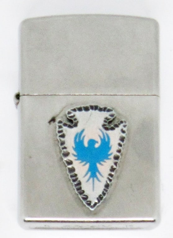 2015 CHROME ZIPPO RAISED ARROWHEAD: 2015 CHROME SILVER TONE ZIPPO LIGHTER WITH RAISED ARROWHEAD TURQUOISE EAGLE DESIGN; USED CONDITION