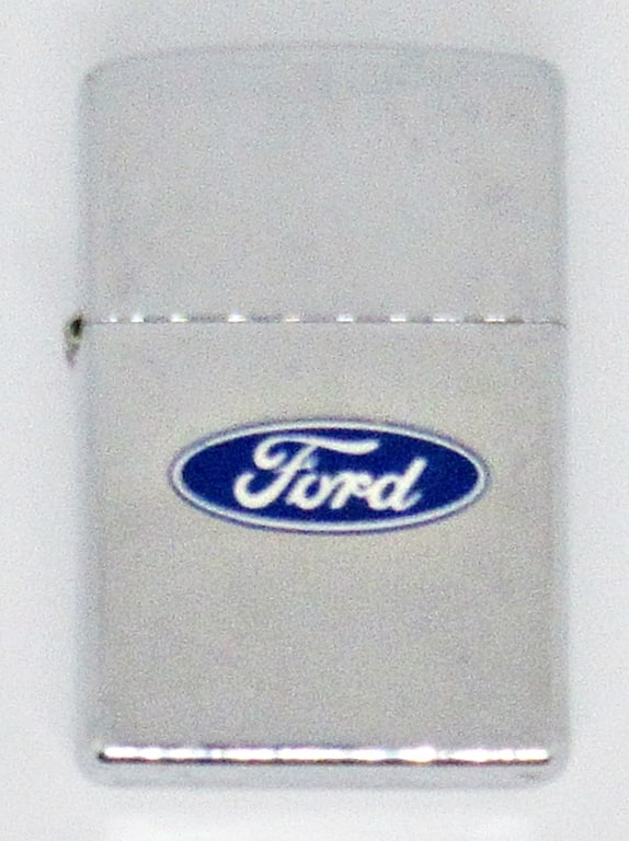 2005 SILVER TONE ZIPPO LIGHTER FORD LOGO: 2005 SILVER TONE ZIPPO LIGHTER WITH FORD LOGO; USED CONDITION