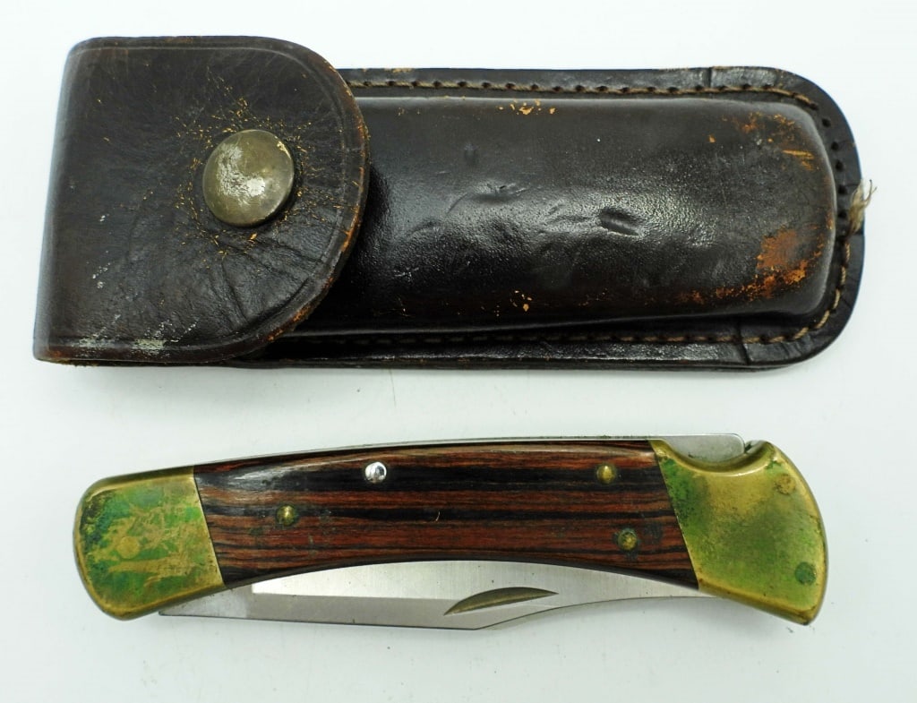 2000 Buck Knife 110 W/ Leather Holder: Used But Good Condition.