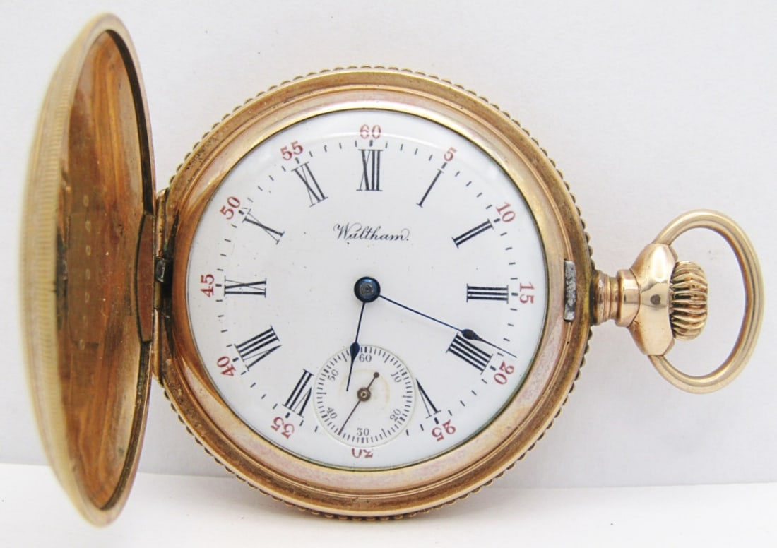 Waltham 15 Jewel Hunter, 0 Size: Roman Numeral Porcelain Dial; Fancy Hinged Yellow Gold Filled Case