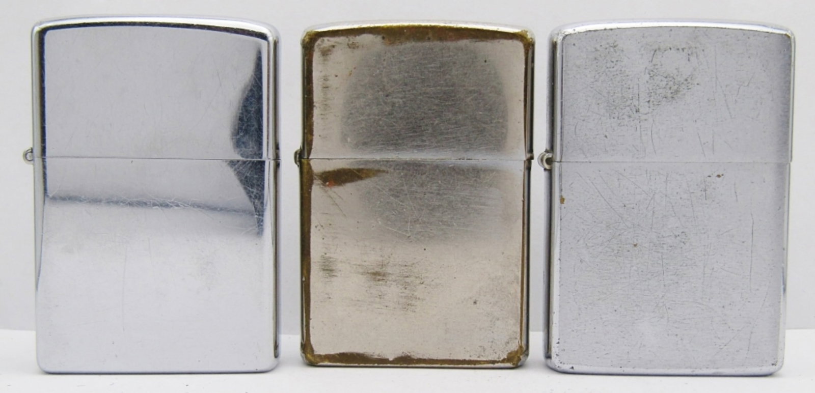 1975, (2) 1977 Vintage Lot of Zippo Lighters;: All Used Conditions