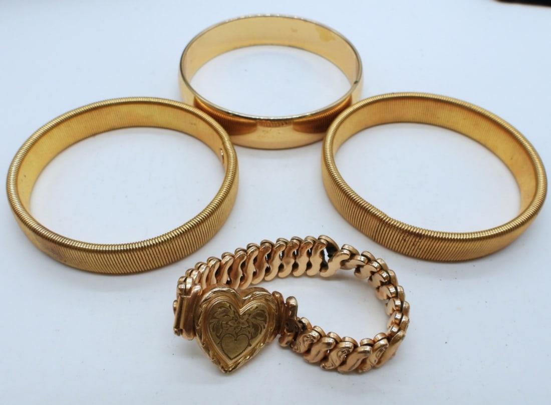 (4) GOLD TONE BANGLES (1 of 3)
