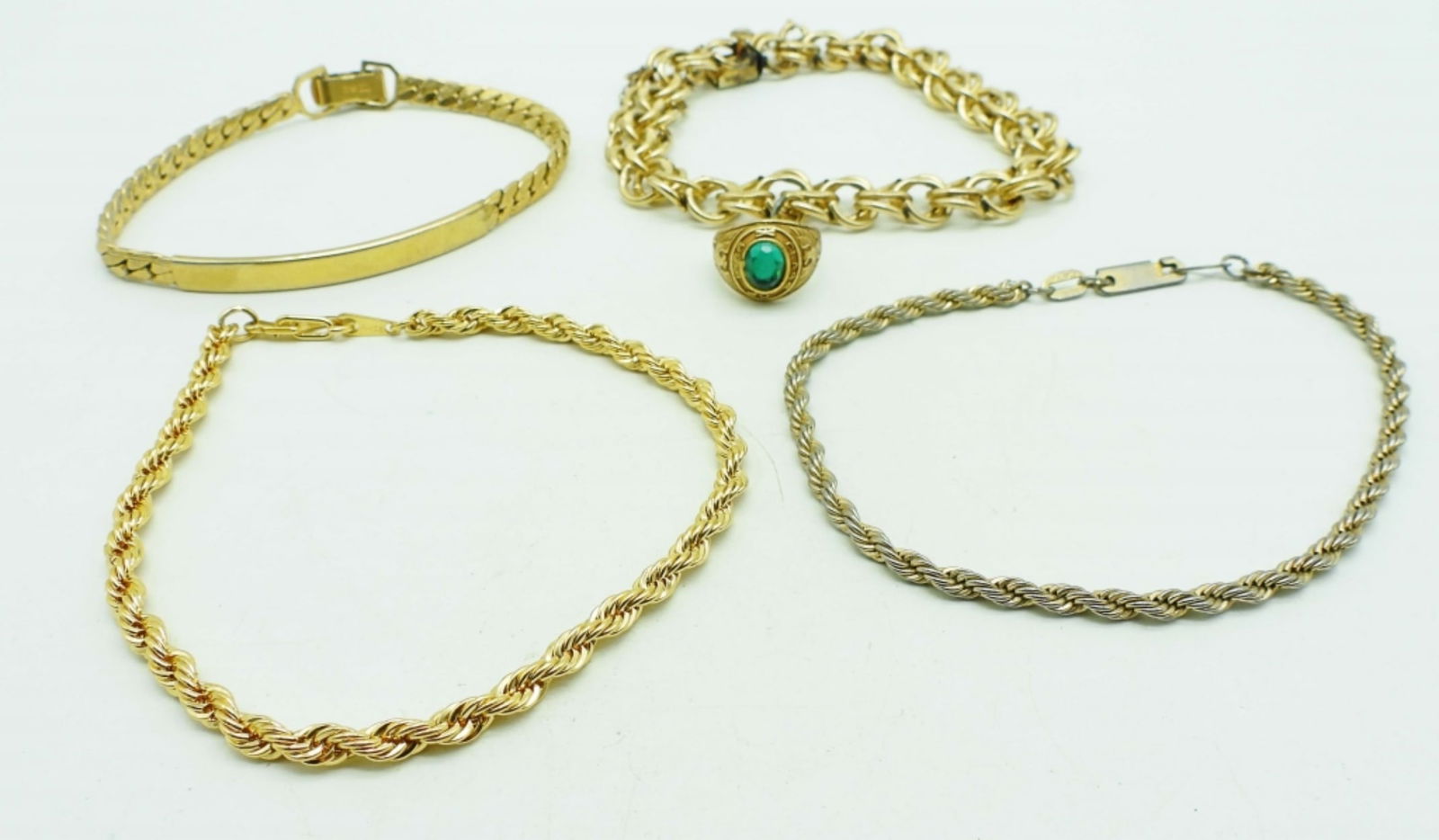(4) GOLD TONE BRACELETS (1 of 5)