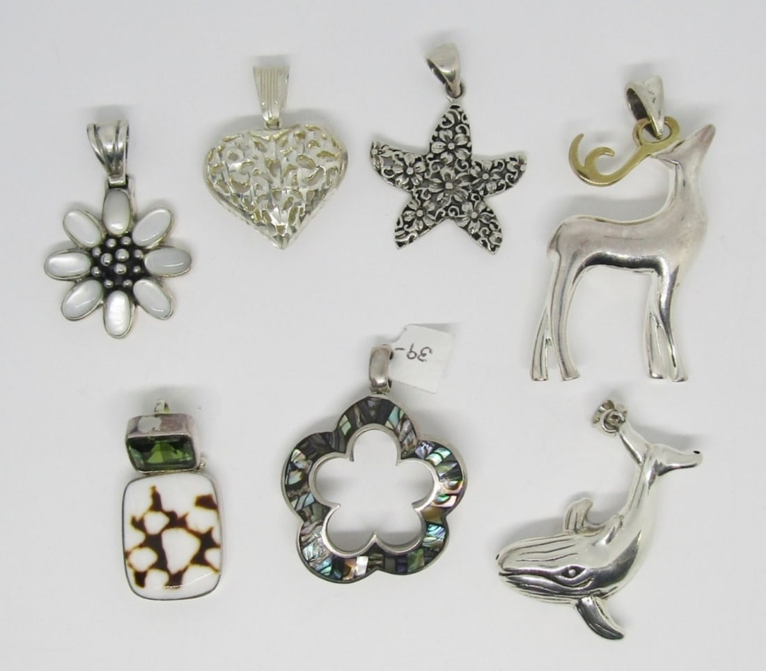Jewelers Lot! (6) Sterling Mix Pendants: 35DWT, a whale, heart, flower with abalone inlay, star with flower design in it, Deer with gold plated for the horns, Flower with mother of pearl for petals, square white and brown gem with a lime sto